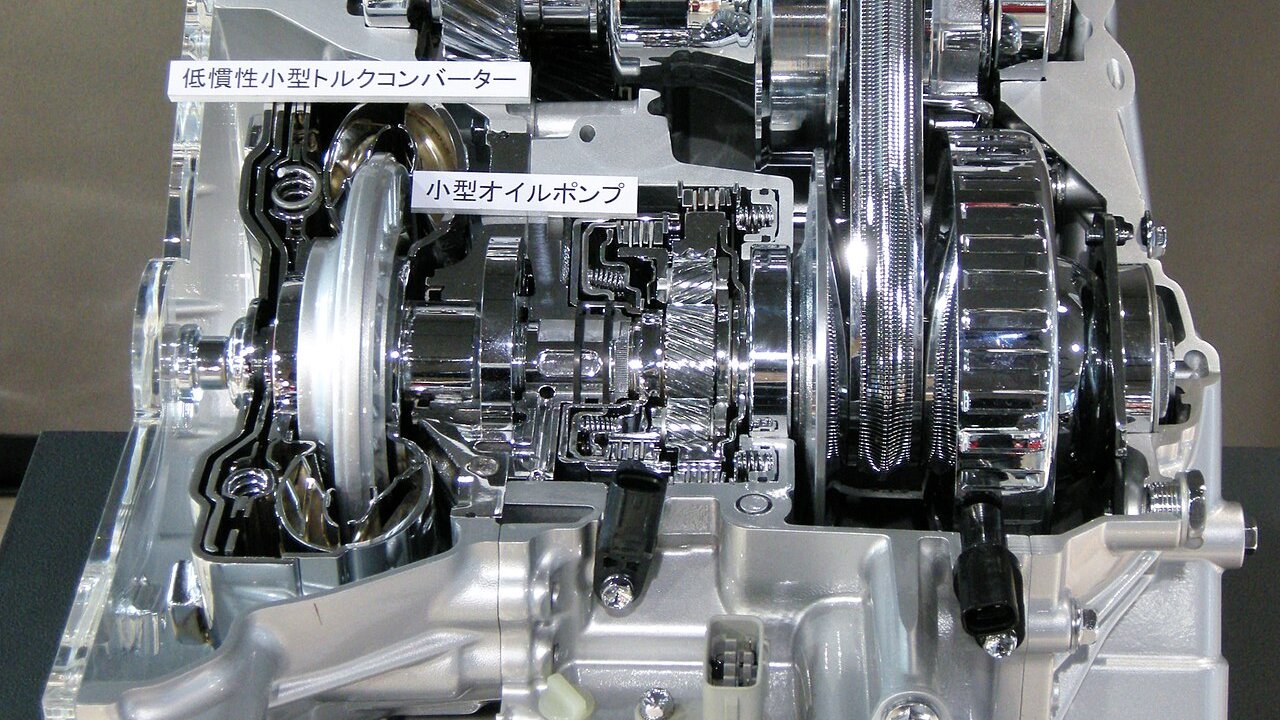 Cutaway of a Toyota Super CVT-i showing the steel belt and pulleys